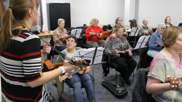 a group of people playing instruments